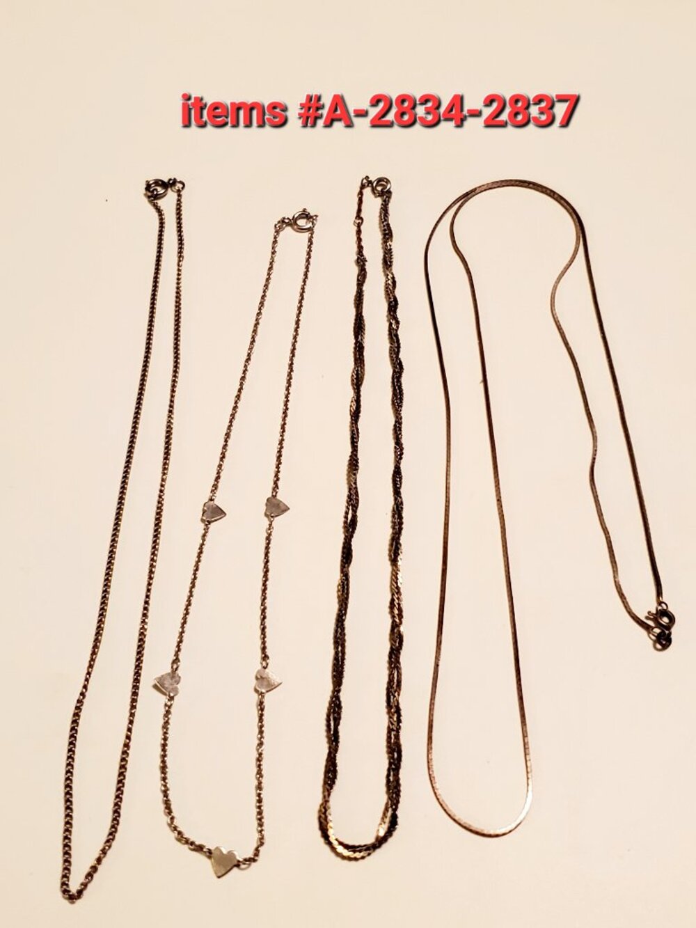 4 Silver Chain Necklaces, items # A -2834-2837,. wt .16 grams.